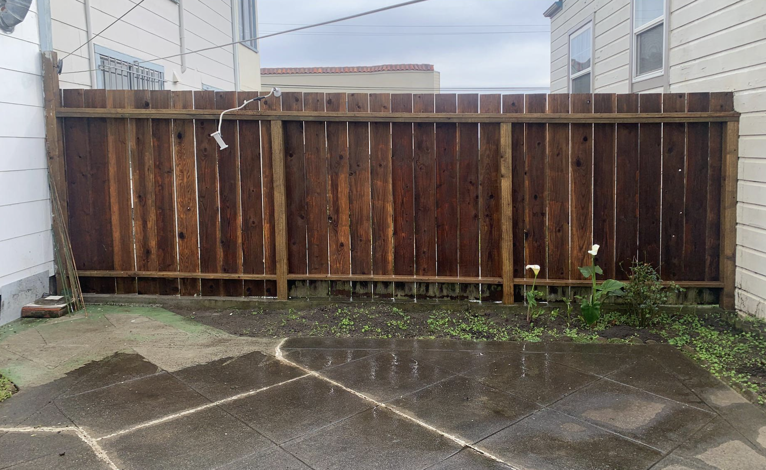 After: Dirty fence before and after cleaning