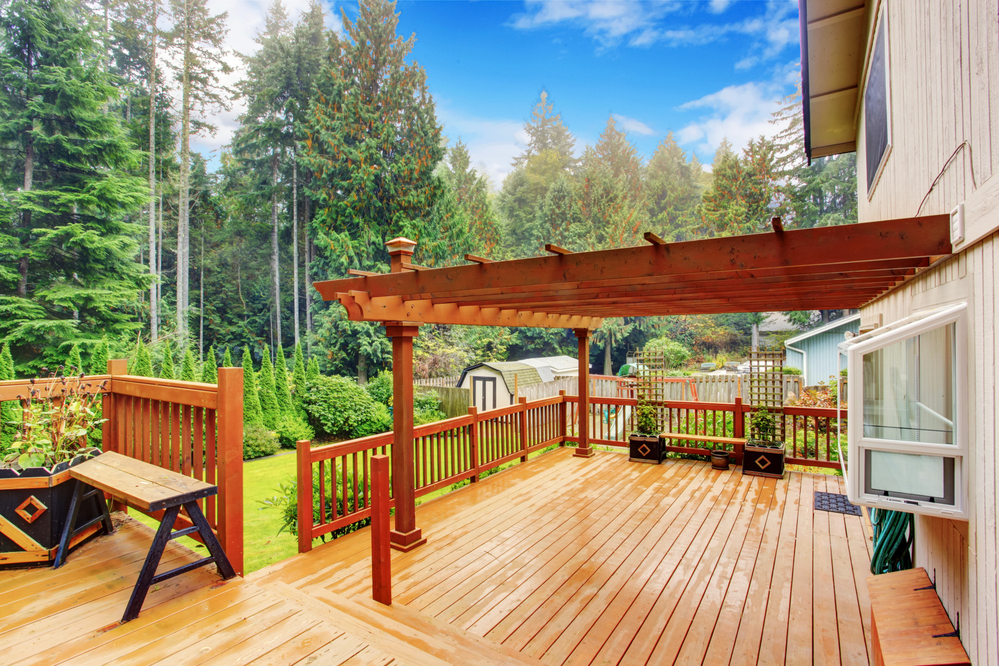 Beautiful wooden deck with pergola
