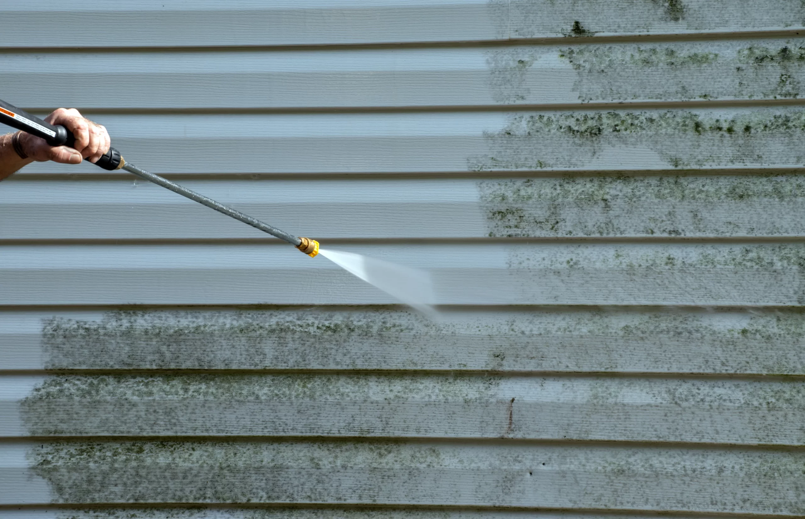 Beautifully clean house siding after soft washing